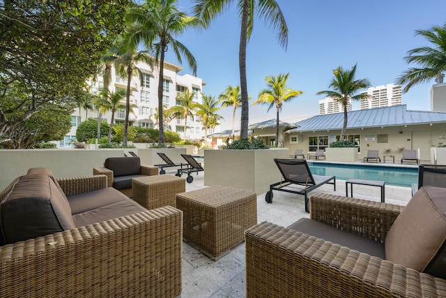 view of patio / terrace featuring a fenced in pool