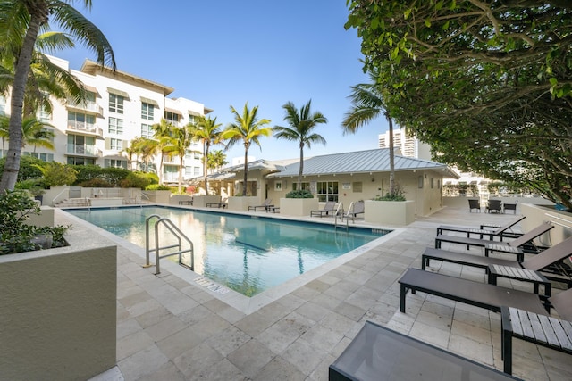 view of swimming pool featuring a patio