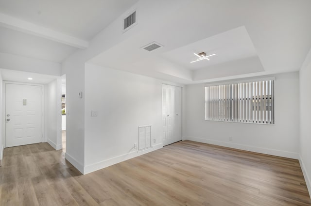 empty room featuring light hardwood / wood-style floors