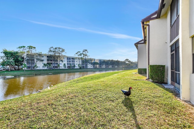 view of yard with a water view