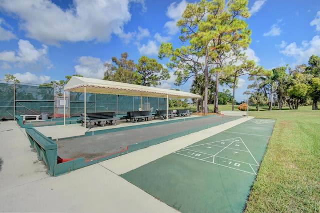 view of home's community featuring a yard