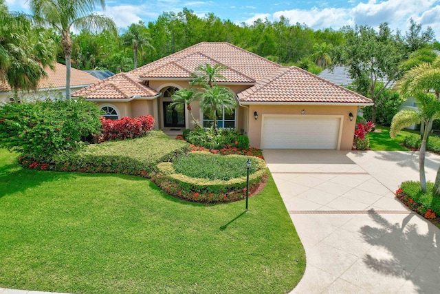 mediterranean / spanish-style house with a garage and a front lawn