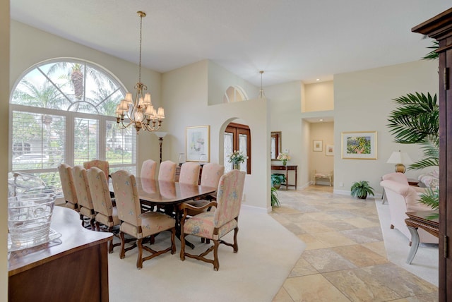 dining area with a notable chandelier