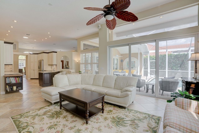 living room with ceiling fan