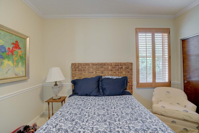 bedroom with ornamental molding