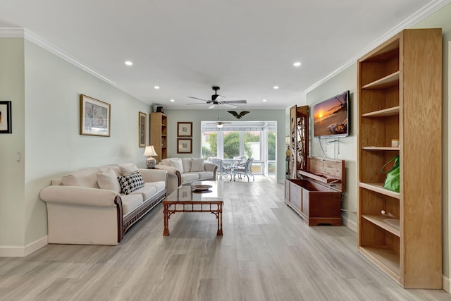 living room featuring ceiling fan, light hardwood / wood-style flooring, and ornamental molding