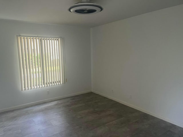 empty room with baseboards