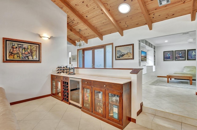 kitchen featuring a healthy amount of sunlight, french doors, light tile patterned floors, and wooden ceiling