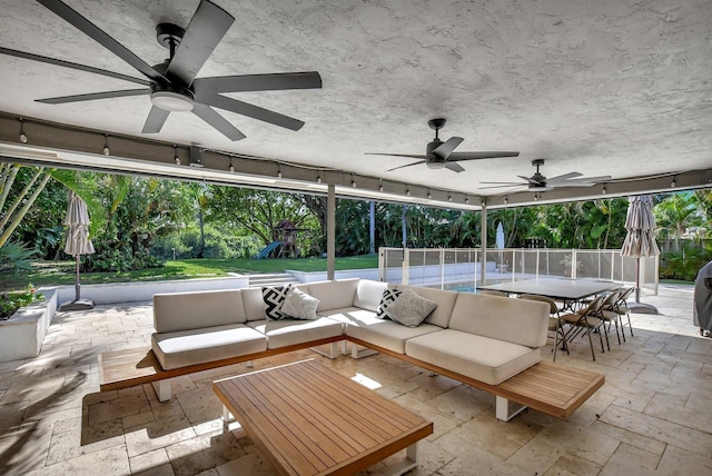 view of patio featuring an outdoor hangout area and a playground