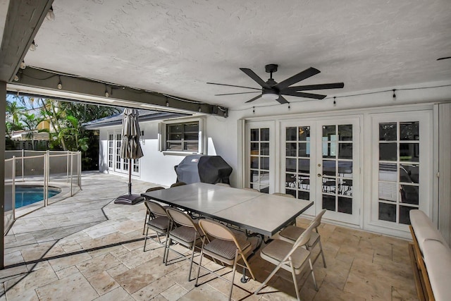 view of patio / terrace with french doors, a fenced in pool, grilling area, and ceiling fan