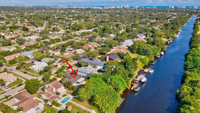 birds eye view of property featuring a water view