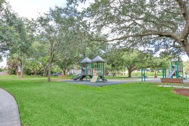 view of jungle gym with a yard