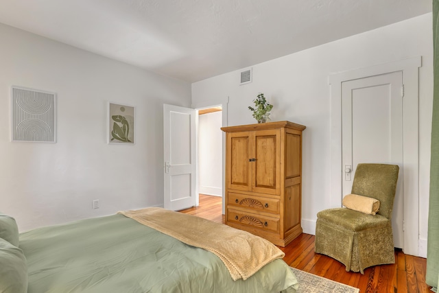 bedroom featuring hardwood / wood-style flooring