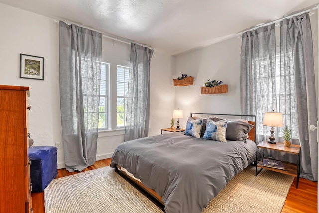 bedroom featuring light wood-type flooring