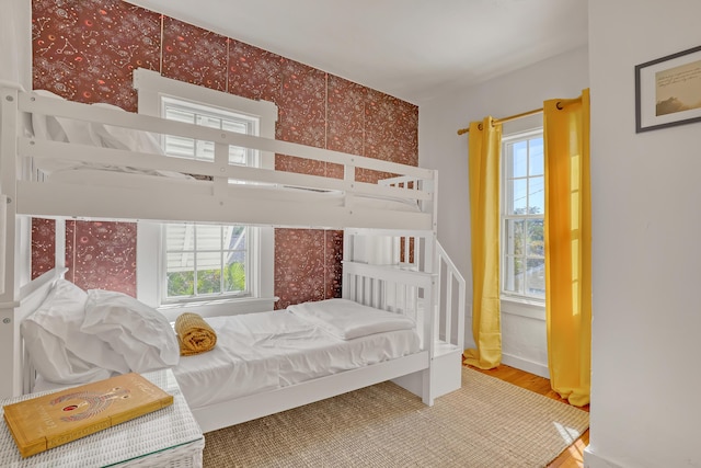 bedroom with hardwood / wood-style floors