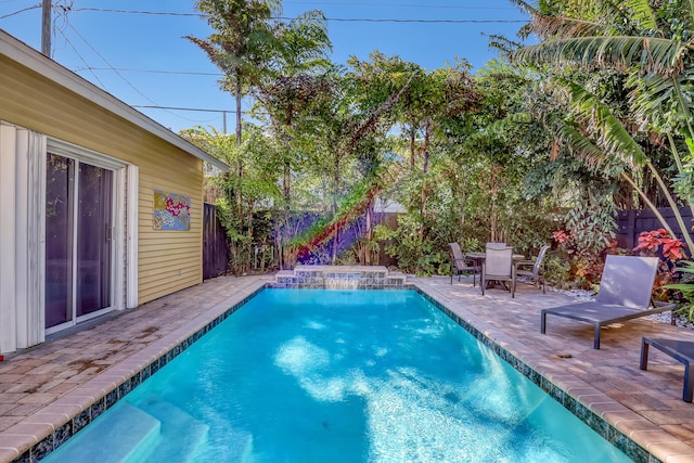 view of pool featuring a patio area