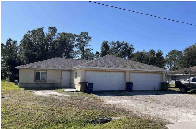 ranch-style house with a garage