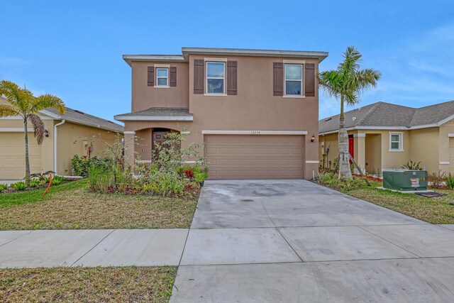 view of front of house with a garage