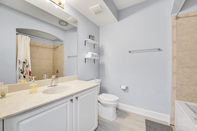 full bathroom with hardwood / wood-style flooring, vanity, toilet, and shower / tub combo