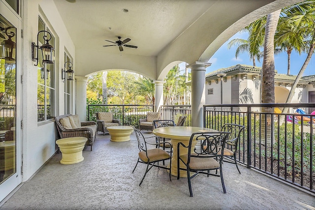 balcony featuring ceiling fan