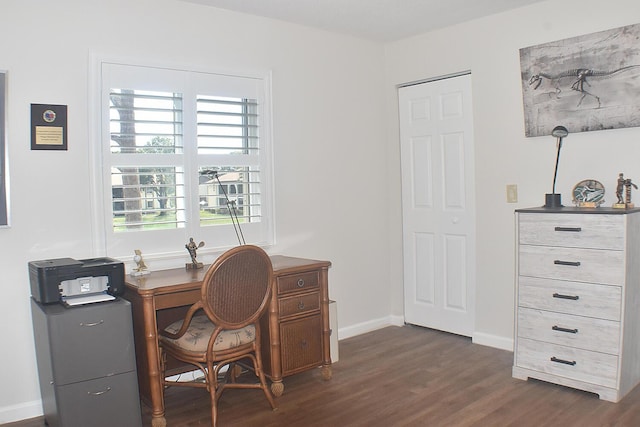 office with dark wood finished floors and baseboards