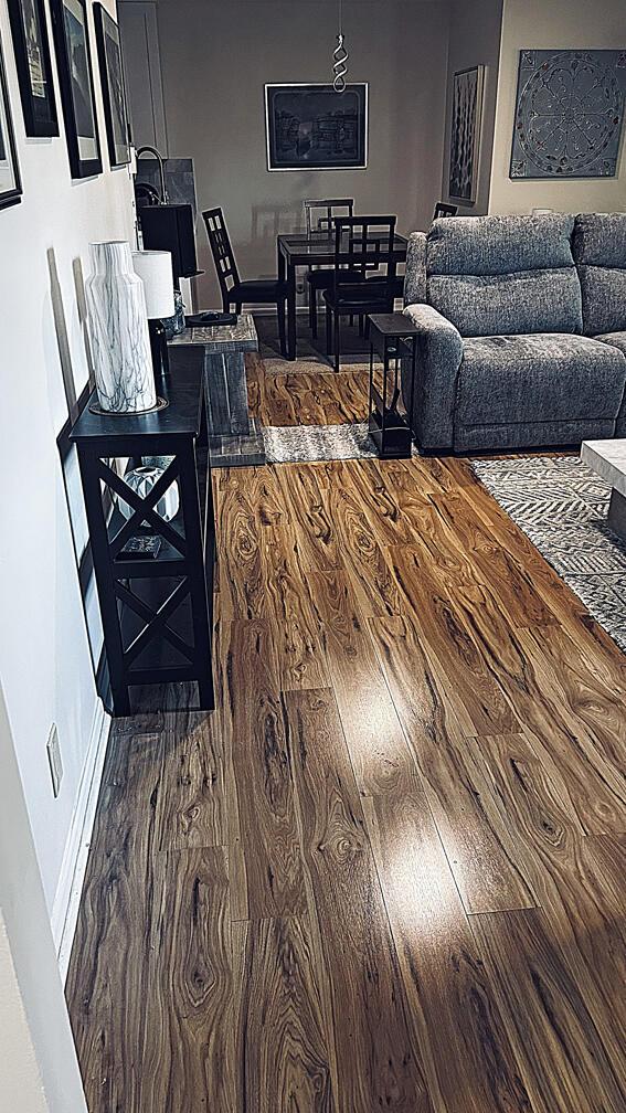 living room with wood finished floors