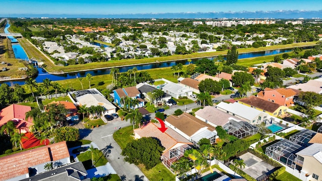 drone / aerial view featuring a water view