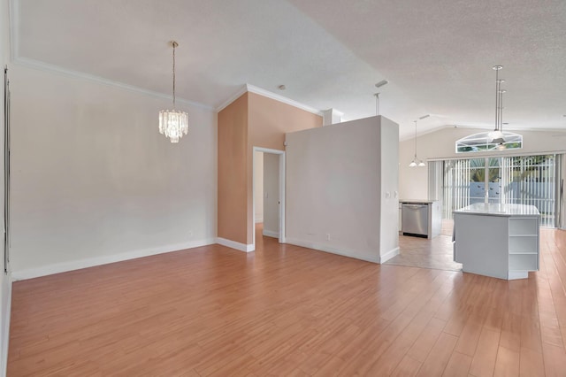 interior space featuring french doors, crown molding, light hardwood / wood-style flooring, vaulted ceiling, and a notable chandelier