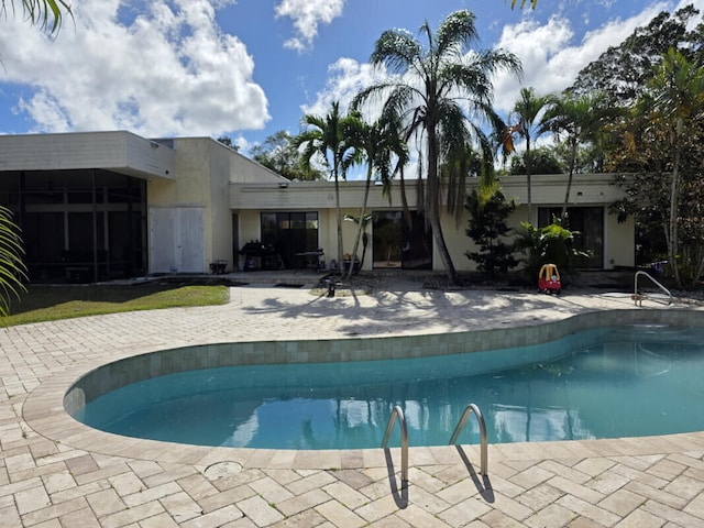 pool featuring a patio