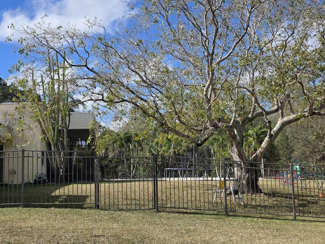 view of yard featuring fence