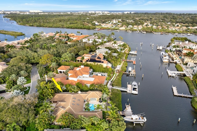 birds eye view of property with a residential view and a water view