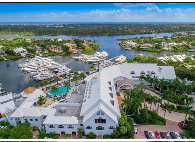 drone / aerial view with a water view