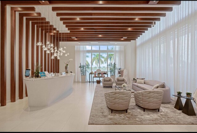 interior space featuring beam ceiling