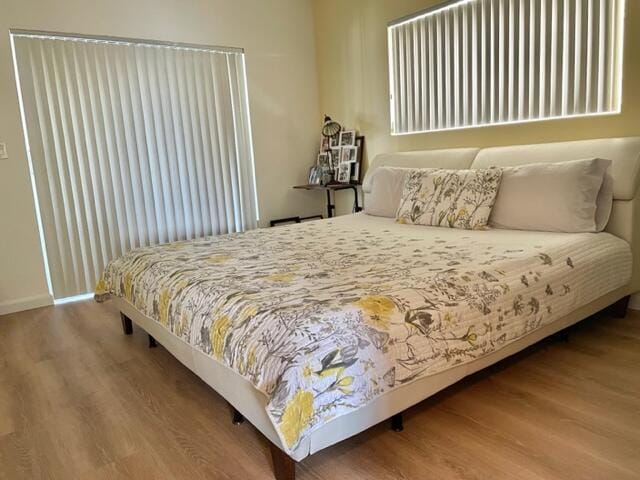 bedroom featuring hardwood / wood-style flooring