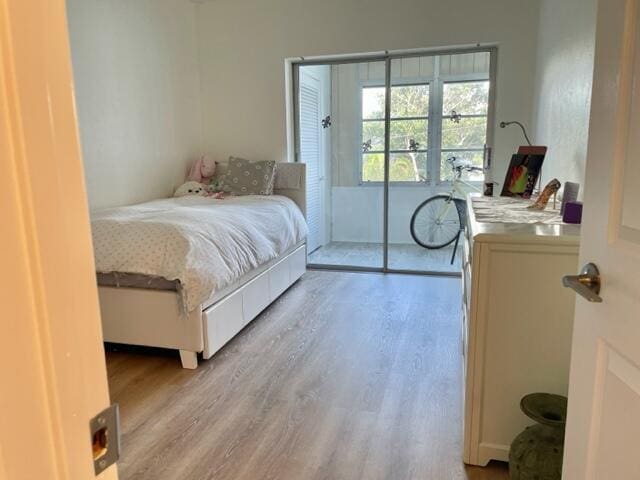 bedroom featuring light wood-type flooring