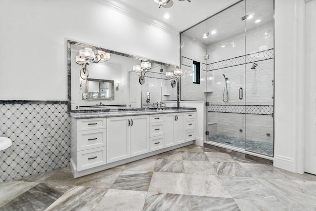 bathroom featuring vanity, walk in shower, and tile walls