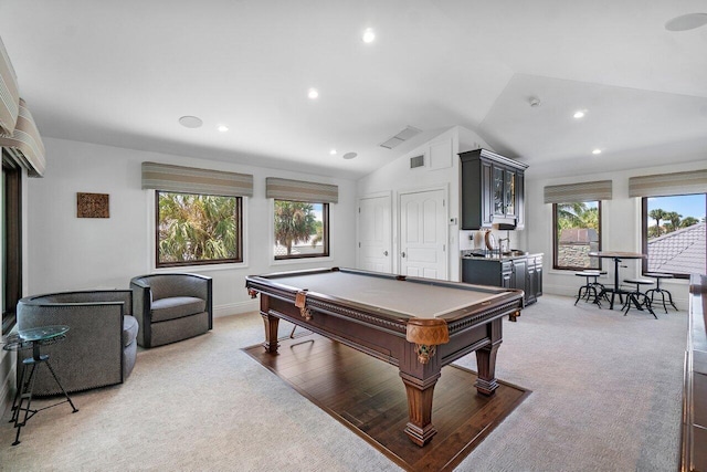 rec room with light carpet, sink, lofted ceiling, and pool table