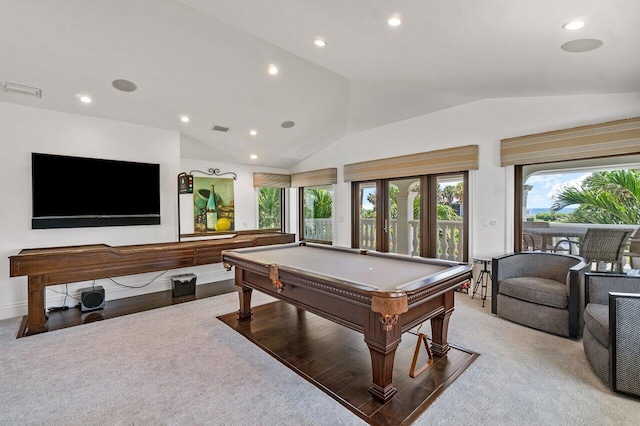 rec room with light colored carpet, lofted ceiling, and billiards