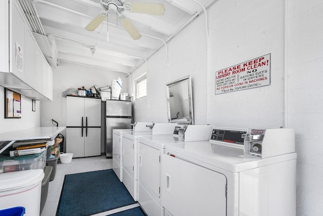 laundry room featuring ceiling fan and separate washer and dryer