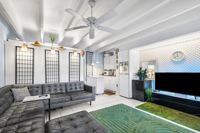 living room featuring beam ceiling, ceiling fan, and light tile patterned floors