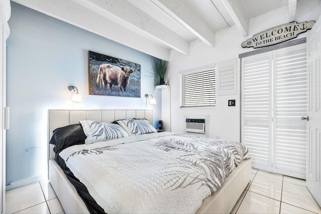 tiled bedroom featuring a wall mounted AC and beamed ceiling