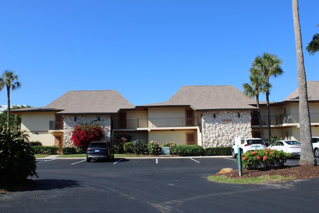 2400 S Ocean Dr Unit 1224, Fort Pierce, FL 34949 - view of building exterior with uncovered parking