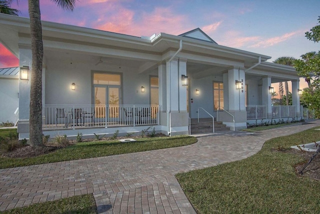 2400 S Ocean Dr Unit 1224, Fort Pierce, FL 34949 - view of front of home with covered porch and stucco siding