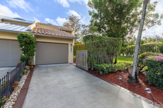 view of front of property featuring a garage