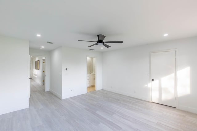 unfurnished room featuring ceiling fan and light wood-type flooring