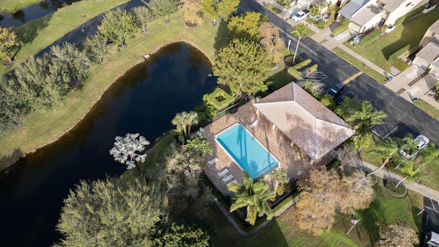 birds eye view of property featuring a water view