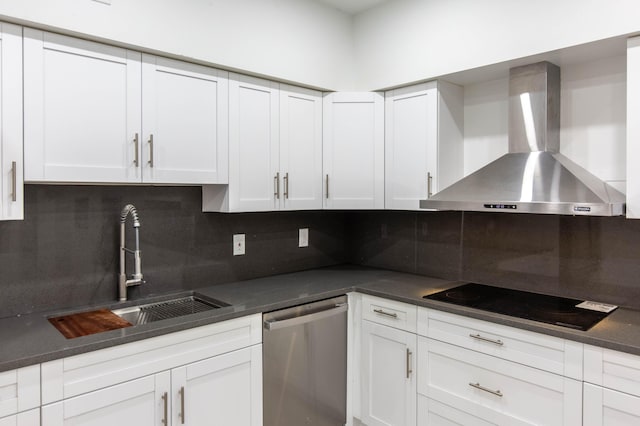 kitchen with white cabinetry, stainless steel dishwasher, wall chimney exhaust hood, and black electric cooktop