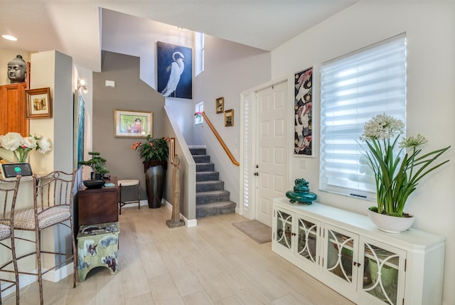 507 Resort Ln, Palm Beach Gardens, FL 33418 - foyer entrance with stairway, light wood-style floors, baseboards, and recessed lighting