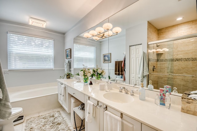 507 Resort Ln, Palm Beach Gardens, FL 33418 - bathroom featuring tile patterned floors, a shower stall, a garden tub, double vanity, and a chandelier