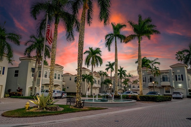 view of outdoor building at dusk